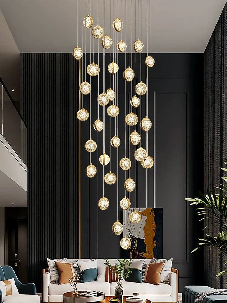 Gold spiral bubble crystal chandelier in modern foyer, K9 sphere design for staircase high ceiling lighting