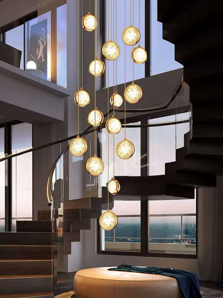 Gold-plated bubble crystal chandelier, with a random arrangement design and K9 crystal balls, suitable for high ceilings in stairwells and entryways.