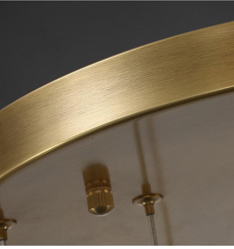 Modern gold cascade crystal chandelier in living room, multi-tier pendant design for high ceiling interior lighting