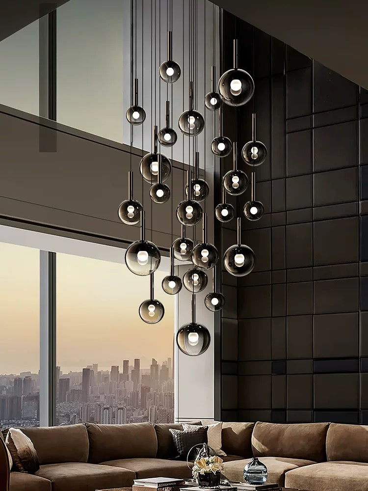 Black ombre glass chandelier, gradient globes in mixed sizes for modern staircase foyer high ceiling lighting