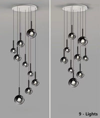 Thumbnail for A unique set of nine gradient-colored glass pendant lights, suitable for high ceilings, features black gradient spherical lampshades of varying sizes and designs, including spiral and random arrangements, ideal for stairwells, foyers, and entryways.