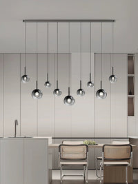Thumbnail for Luxurious gradient-colored glass pendant light, suitable for dining room islands.