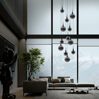 Thumbnail for Modern living room with a chandelier and large windows.