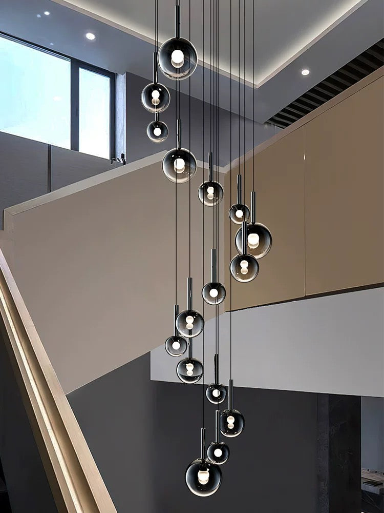 Modern ombre glass chandelier lighting, gradient black globes in spiral design for staircase foyer high ceiling