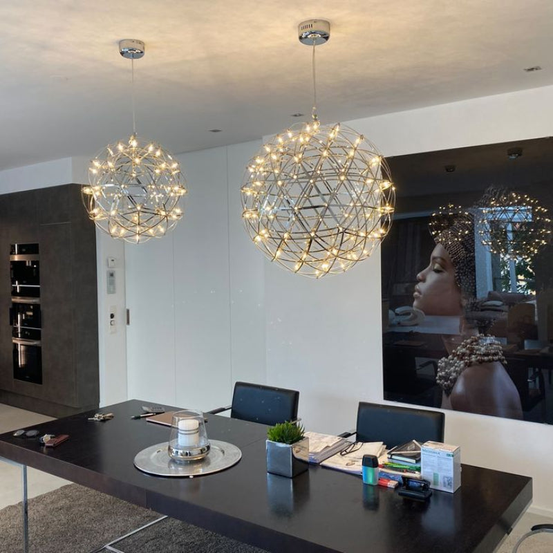 This modern restaurant LED chandelier features a chrome-plated starburst dandelion design, suitable for restaurant ceiling lighting.