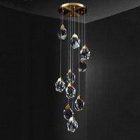 Thumbnail for Irregular crystal chandelier lighting detail, brass finish with raw-cut geometric K9 prisms for foyer stairwell