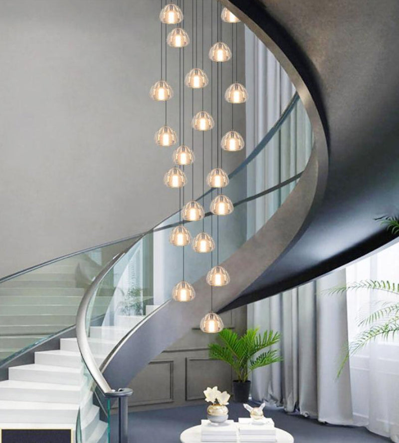 Modern American crystal chandelier with spiral pattern creating classic elegance for grand staircase foyer entryway ceiling