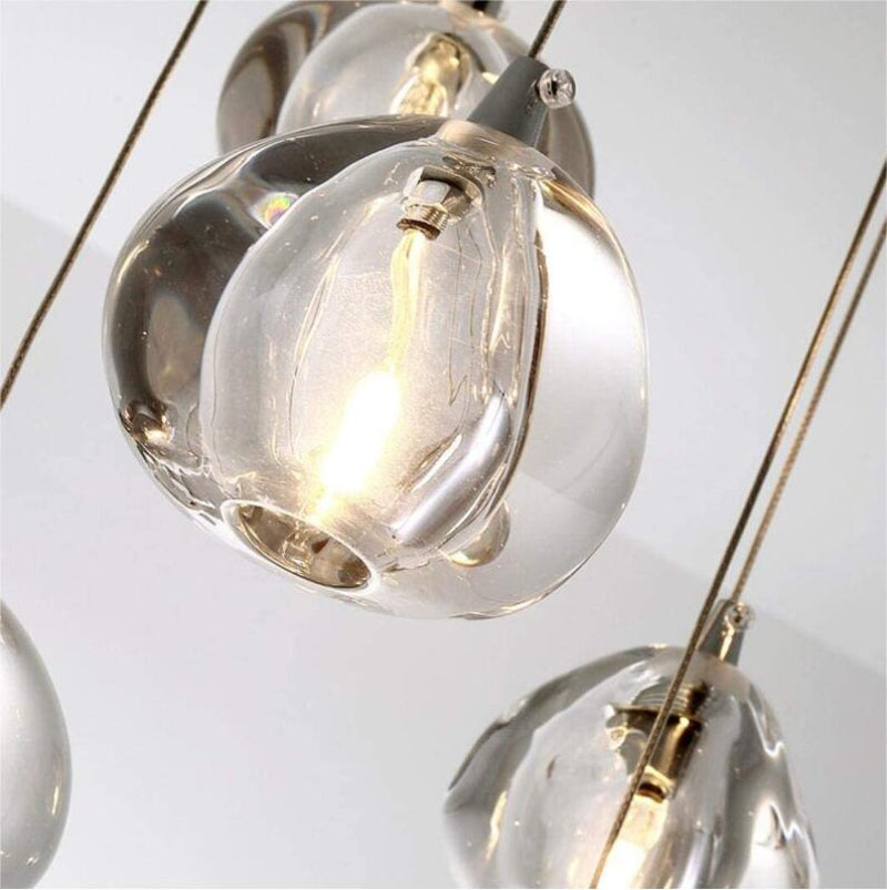 American-style luxury crystal chandelier for staircases, with adjustable height. The images show actual photos of the crystal components.