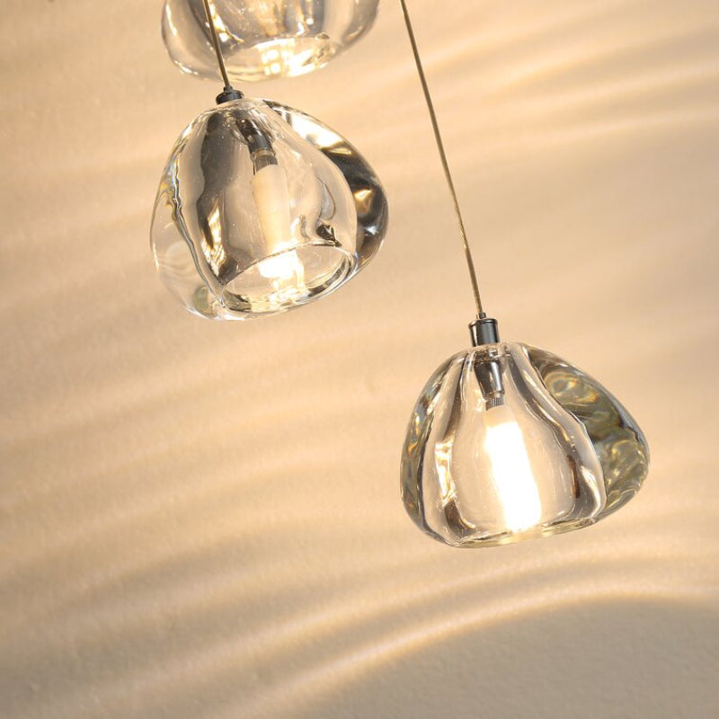 Contemporary American foyer chandelier with crystal fixtures at varying heights for modern staircase entryway high ceiling