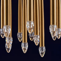 Thumbnail for Gold chandelier with crystal drops against a black background