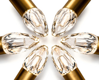 Thumbnail for Crystal nail tips with gold bases arranged in a circular pattern on a white background