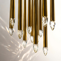 Thumbnail for Gold chandelier with crystal-like ends on a neutral background
