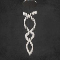 Thumbnail for Statement ceramic petal chandelier with nature-inspired hummingbird accents creating artistic focal point for staircase,double helix arrangement