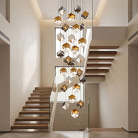 Thumbnail for Elegant ice cube staircase chandelier with textured glass pendant creating water-pattern light effect for foyer entryway lighting