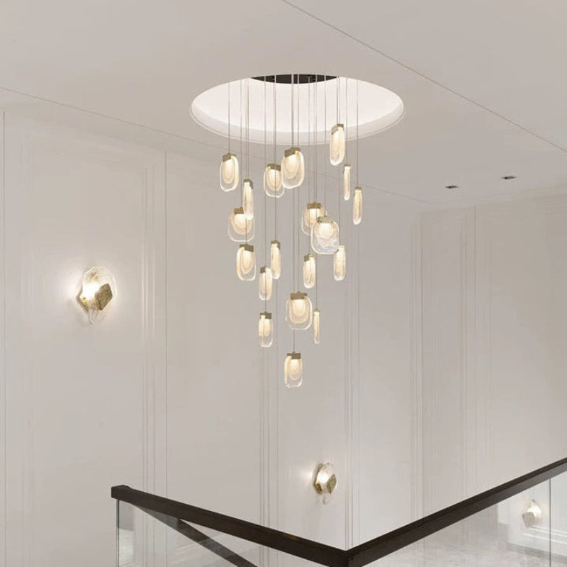 Luxurious gold cascade crystal chandelier, waterfall pendant design for dining room foyer high ceiling entryway