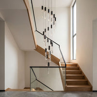 Thumbnail for Luxury LED linear K9 crystal rod chandelier with cascading design creating elegant ambiance in grand residential foyer staircase