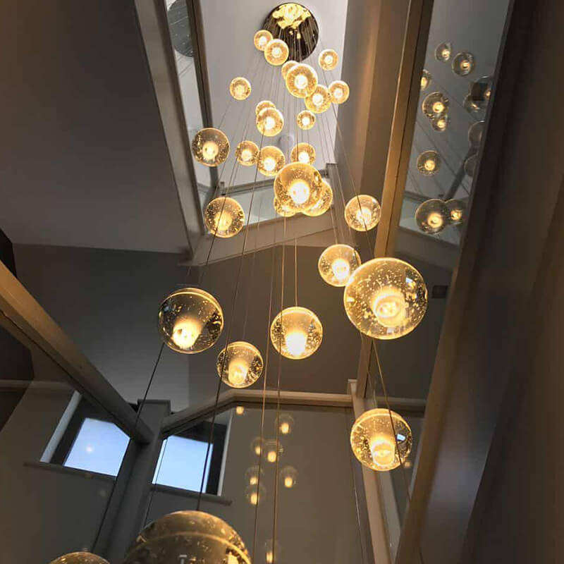 Chrome bubble crystal chandelier with dimmable LED floating orbs and premium K9 crystal for staircase foyer entryway installation
