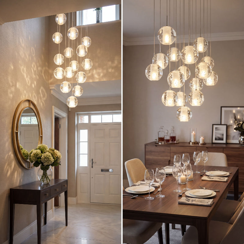 Premium chrome bubble crystal chandelier with dimmable LED floating orbs creating dramatic illumination in luxury stairwell foyer void