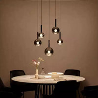 Thumbnail for Glass gradient pendant lights, featuring black gradient spherical lampshades, are available in various sizes and are suitable for spaces with high ceilings such as restaurants and entryways.