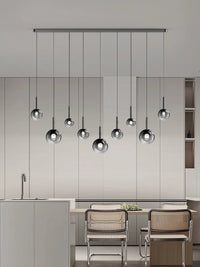 Thumbnail for Luxurious gradient-colored glass pendant light, suitable for dining room islands.