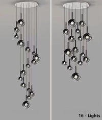 Thumbnail for This 16-light bubble pendant lamp features gradient black glass spheres of varying sizes, available in both random and spiral arrangements.  It is ideal for illuminating high-ceiling spaces such as stairwells and foyers.