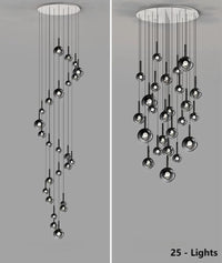 Thumbnail for This chandelier features 25 bubble-shaped, gradient pendant lights with black gradient glass spheres of varying sizes.  Both spiral and random arrangements are available, making it suitable for lighting spaces with high ceilings such as restaurants and lobbies.
