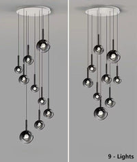 Thumbnail for A unique set of nine gradient-colored glass pendant lights, suitable for high ceilings, features black gradient spherical lampshades of varying sizes and designs, including spiral and random arrangements, ideal for stairwells, foyers, and entryways.