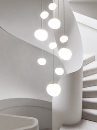 Thumbnail for Minimalist stellar pendant light with ethereal white spheres mimicking starlit sky for modern stairwell foyer entryway