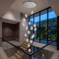 Thumbnail for Designer Arctic Drift handcrafted ice crystal chandelier with geometric cube design creating dramatic lighting in contemporary stairwell void