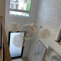 Thumbnail for Modern LED firework/starburst pendant light, featuring a chrome-plated dandelion design, suitable for high-ceiling areas such as foyers and entryways.