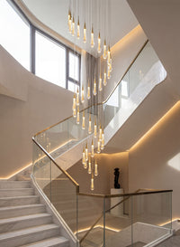 Thumbnail for Artistic Champagne Rain crystal raindrop chandelier with custom cluster creating sophisticated ambient lighting in luxury residential foyer