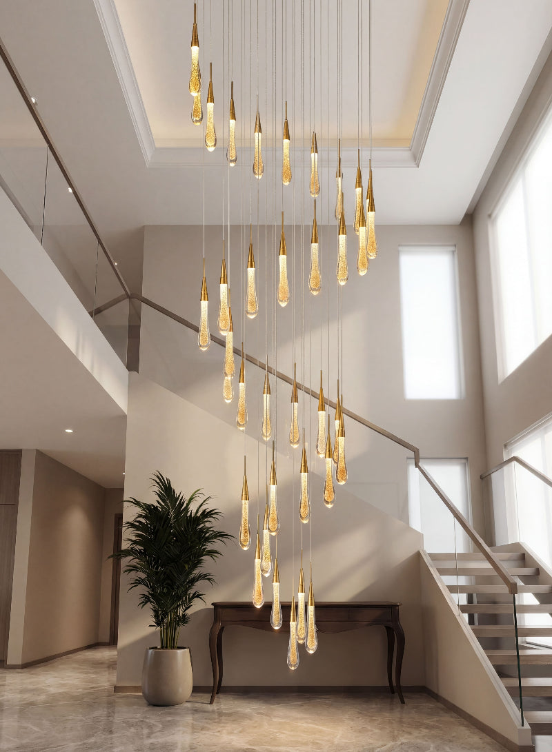 Luxury Champagne Rain crystal raindrop chandelier with gold powder creating brilliant sparkle and elegant ambiance in grand entryway