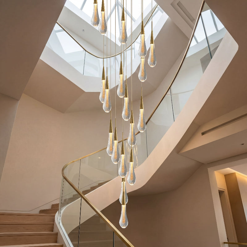 Premium Champagne Rain crystal raindrop chandelier with random permutation creating elegant light refraction in contemporary staircase foyer