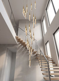 Thumbnail for Statement Champagne Rain crystal raindrop chandelier with gold accents creating luxurious illumination in modern high ceiling entryway space