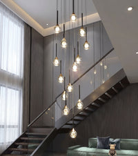 Thumbnail for Luxury Gemstone Cascade mosaic crystal chandelier with laser-engraved moon K9 spheres creating brilliant sparkle in grand staircase entryway