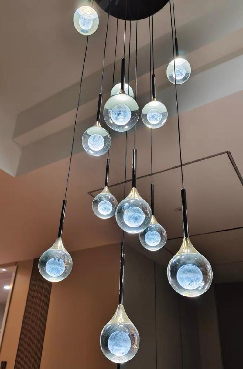 New style mosaic crystal chandelier with Gemstone Cascade laser-engraved moon K9 spheres creating white light for foyer staircase entryway