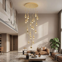 Thumbnail for Luxury Golden Tears crystal teardrop chandelier cluster with internal bubble effects creating brilliant sparkle in contemporary residential entryway
