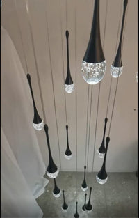 Thumbnail for Black crystal teardrop chandelier with Golden Tears solid crystal bubble effects creating sophisticated lighting for staircase foyer two-story ceiling