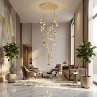 Thumbnail for Artistic black Golden Tears crystal teardrop chandelier with internal bubble effects creating dramatic lighting installation in contemporary foyer