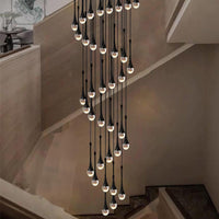 Thumbnail for Modern black crystal teardrop chandelier featuring Golden Tears solid crystal with bubble effects in spiral arrangement for foyer staircase entryway