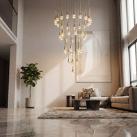 Thumbnail for Premium Golden Tears crystal teardrop chandelier with internal bubble effects creating sophisticated ambient lighting in luxury residential staircase