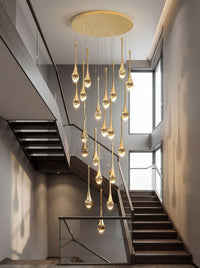 Thumbnail for Contemporary gold Golden Tears crystal teardrop chandelier with solid crystal bubbles creating cascading lighting in modern two-story foyer staircase