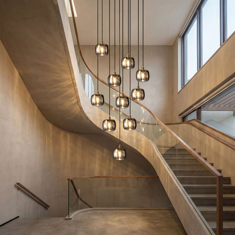 Contemporary cubic rain chandelier with geometric square crystals creating waterfall lighting effect in modern high-ceiling foyer