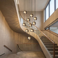 Thumbnail for Contemporary cubic rain chandelier with geometric square crystals creating waterfall lighting effect in modern high-ceiling foyer