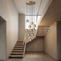 Thumbnail for Geometric square K9 crystal chandelier with spiral cascade design providing sophisticated lighting for luxury home stairwell
