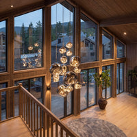 Thumbnail for Statement Magma Flow lava bubble pendant light with flowing molten glass design creating luxurious ambiance in modern living space