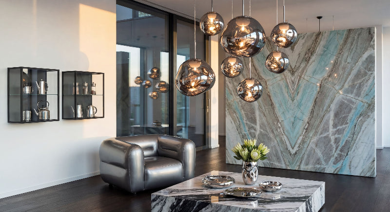 Statement Magma Flow lava bubble pendant light with flowing molten glass design creating luxurious ambiance in modern living space