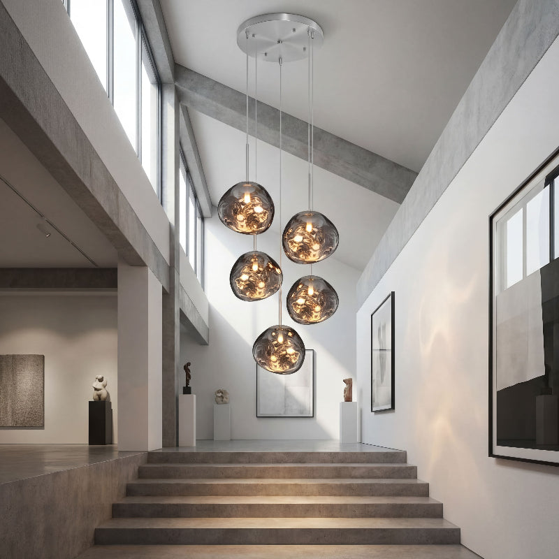 Luxury Magma Flow lava bubble pendant cluster with molten glass creating dramatic ambient lighting in contemporary residential space