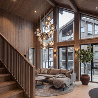 Thumbnail for Modern Magma Flow lava bubble chandelier cluster with molten glass creating dynamic sculptural lighting in high ceiling foyer