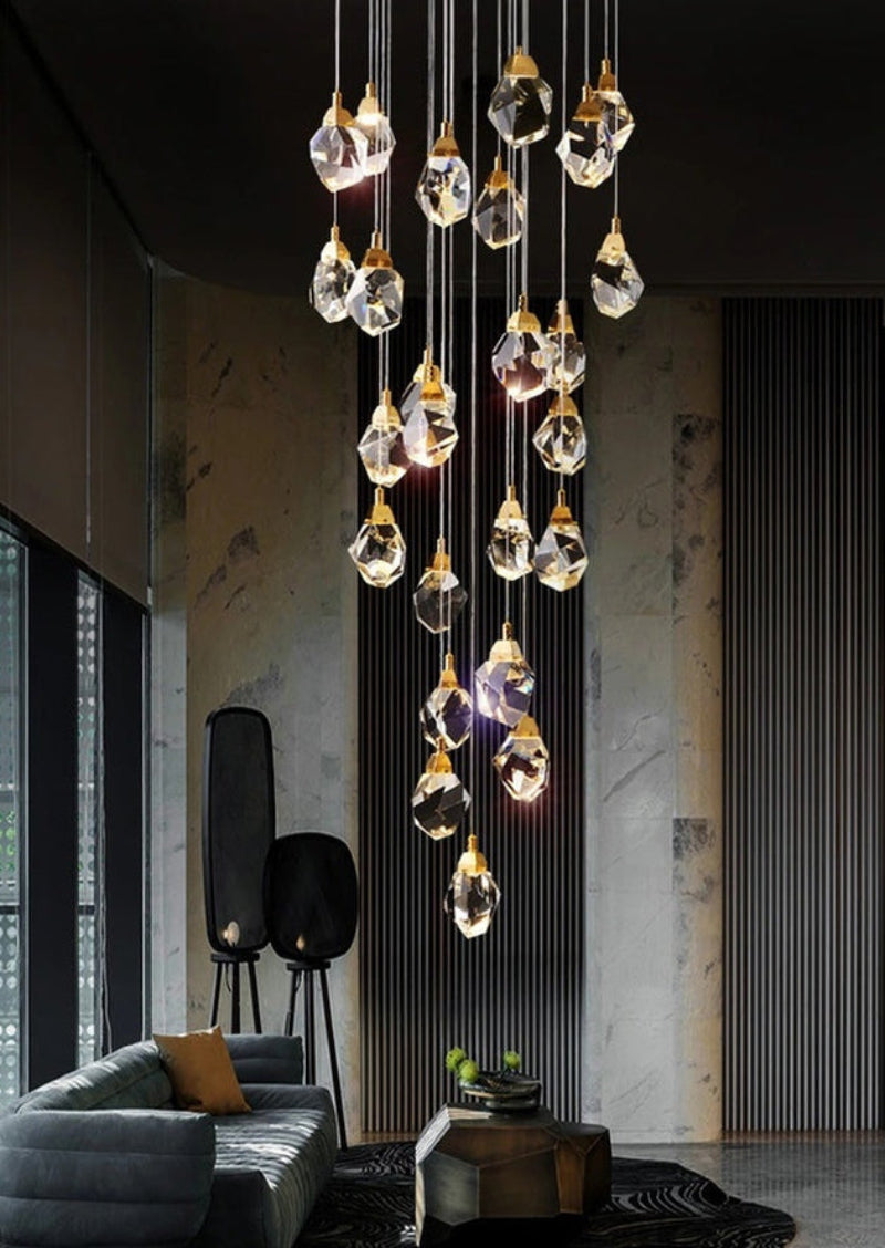 Brass irregular crystal chandelier cluster, raw-cut K9 prisms with geometric facets for modern foyer lighting